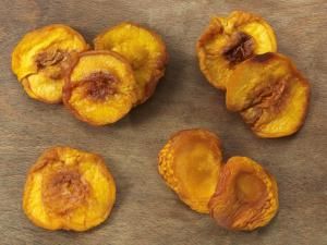 Dried Peaches - David Bishop Inc./Stockbyte/Getty Images                                                                                                                                                      More Dehydrated Strawberries, Dried Pears, Dehydrated Apples, Dried Peaches, Dehydrated Fruit, Dried Apples, Peach Recipe, Dehydrated Food, Dehydrator Recipes