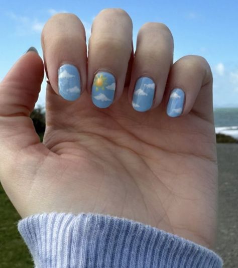 Baby blue nails with clouds and sun Cute Cloud Nail Art, Sun And Cloud Nails, Blue Cloud Nail Designs, Blue Nails Clouds, Blue Nails With Clouds, Nail Art Clouds, Weather Nail Art, Blue Cloud Nails, Sun Nails Design