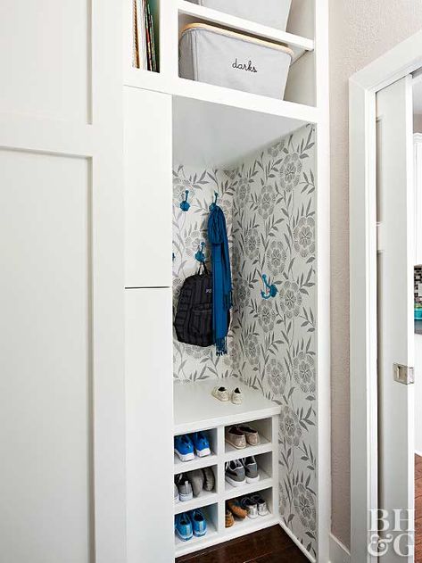 In a small space such as an entryway, vertical storage is key. This doorless closet-turned-cubby uses a storage shelf to keep shoes out of the way. #entryways #frontentryway #openentryway #diyentryway #bhg Small Coat Cupboard Ideas, Front Closet Cubbies, Doorless Coat Closet, Small Entryway Closet Organization, Coat Closet Wallpaper, Small Mudroom Closet, Front Hall Closet Makeover, Doorless Closet Ideas, Small Coat Closet Makeover