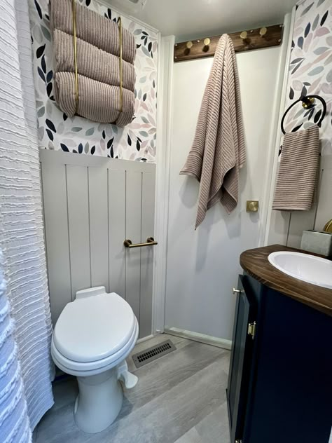 7 Ways to Make Your RV Interior Look Bigger | RV Obsession Rv Towel Storage, Bathroom Towel Storage Ideas, Towel Storage Ideas, Small Bathroom Storage Cabinet, Rv Inspiration, Camper Bathroom, Rv Interior Remodel, Camper Interior Design, Bathroom Towel Storage