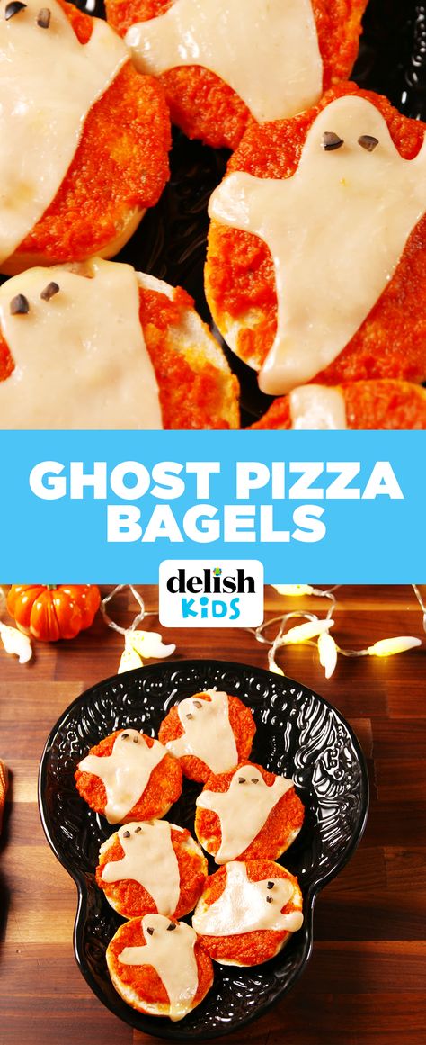 Ghost Pizza Bagels are the scary-easy dinner your kids need. Get the recipe at Delish.com. Pizza Ghost, Halloween Wednesday, Ghost Pizza, Spooky Dinner, Halloween Pizza, Halloween Foods, Themed Treats, Pizza Bagels, Halloween Sweets