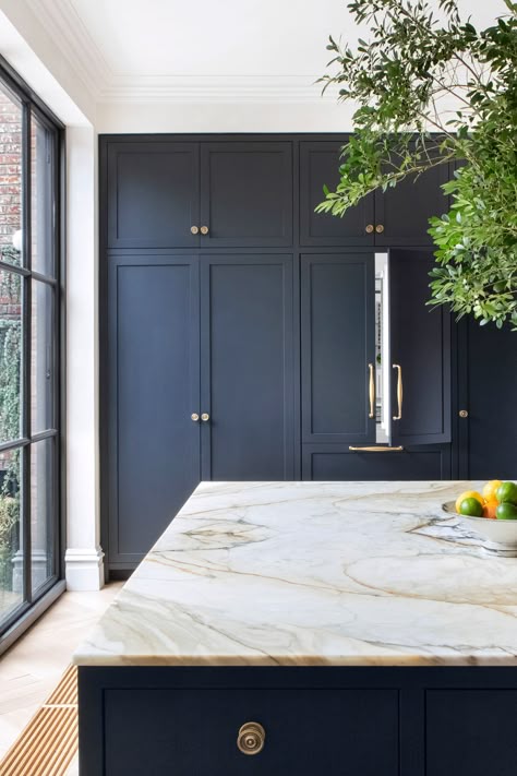 The dark blue cabinetry was essential to achieving the light and dark contrast that was desired in this kitchen, hiding the Fisher & Paykel Integrated French Door Refrigerator perfectly. The marble benchtop was chosen for its dramatic veining, while the light tones of parquet floor add a bit of texture without upsetting that contrast of light and dark. Architect: Elizabeth Roberts Architects. Designer: Athena Calderone. Photographer: Sarah Elliott. Location: Brooklyn, United States. Dröm Hus Planer, Dark Blue Kitchens, Navy Blue Kitchen, Navy Kitchen, Sri Ram, Eden Park, Blue Kitchen Cabinets, Fisher Paykel, Home Luxury