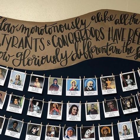 Katie Bogner on Instagram: "(Read on for a blog-length-description:😉) I finished this bulletin board a couple of days ago but it still needed a title, so like a modern teacher 👩🏼‍🏫 I asked in Instastories for ideas. You guys had some brilliant suggestions! But... I ended up not using any of them. 😂 This display has a little image for each of my 8th graders with their (future) Confirmation Saint🔥- I wanted a way to help me remember who they had chosen and to work them into lessons and conversations, and also to remind the kids to be asking for the Saints’ prayers, 🙏🏻 so setting this up seemed like a great idea. I got the list, found pics, typed it all up, printed, cut... and then realized that with the white borders they unintentionally looked like polaroids. 🤦🏼‍♀️ (swipe to see c Catholic Bulletin Boards, Modern Teacher, Jack G, Catholic School, Catholic Kids, I 8, Mary Elizabeth, Cs Lewis, Bulletin Boards