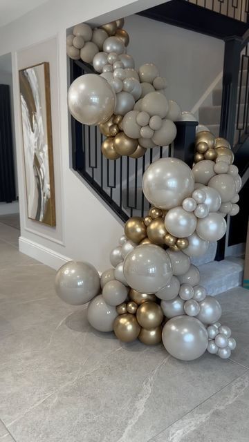 Marley & Nusha Events on Instagram: "Simply luxe ✨  Creating a super sophisticated feel for this staircase balloon garland.  Using a bespoke colour palette & organic balloon styling for an elegant finish.   Save for inspo 👇🏼   .  .  .  #marleyandnusha #balloons #organicballoons #staircaseballoons #luxuryballoons #balloongarland #balloonstyling #balloonstylist #ballooninspo #balloonideas #leeds #wakefield #bradford #huddersfield #westyorkshireballoons" Elegant Balloon Decor, Stairwell Balloon Garland, Elegant Balloon Arch, Balloons On Staircase, Staircase Balloon Garland, Balloon Staircase, Elegant Balloon Decorations, Balloon Garland Ideas, Balloon Styling