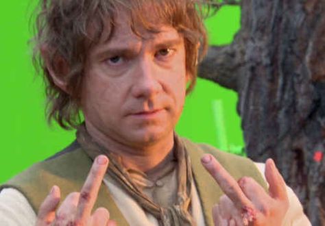 The 'why am I still working' shot. | The 21 Most Glorious Photos Of Bilbo Baggins Giving The Finger. Martin Freeman's personal gang sign? Giving The Finger, Bilbo Baggins, Martin Freeman, The Hobbit, Wizard, Screen