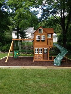 Mulch wood, wooden playset, swings, plastic slide and loads of fun for the kids.  See more excellent work at http://www.tristatedeliveryandassembly.com Swing Set Diy, Playground Landscaping, Backyard Playset, Backyard Ideas For Small Yards, Amazing Backyard, Play Area Backyard, Backyard Kids Play Area, Outdoor Play Areas, Diy Playground