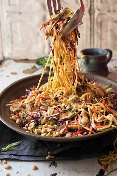 Satay Chicken Noodle Salad being tossed with dressing. Chicken Noodle Salad, Satay Chicken, Tin Recipes, Peanut Dressing, Recipetin Eats, Recipe Tin, Chicken Satay, Noodle Salad, Geometric Print Dress