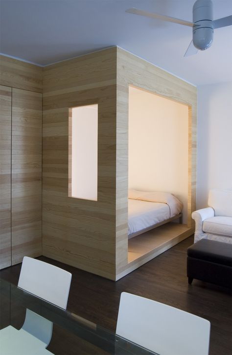 11 Hidden Beds in Small Homes - Photo 4 of 11 - In this tiny studio apartment in Brooklyn, Framework Architecture created a partially enclosed sleeping nook, which snuggly fits a full-sized bed. Framework Architecture, Studio Apartment Organization, Multipurpose Bedroom, Enclosed Bed, Sleeping Nook, Tiny Studio Apartments, Bedroom Nook, Hidden Bed, Tiny Apartments