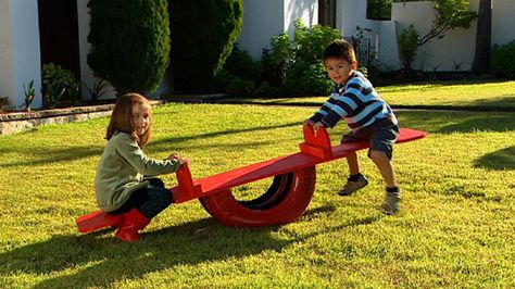 How to build a see-saw: Kids love see-saws, so imagine their delight when you make them their very own. And see-saws don’t come any more budget friendly than this little beauty. All you need is a few pieces of plywood, an old tyre and a little paint. The seesaw is light enough to move around so, if one area of your lawn is becoming worn, just relocate it to another spot. This is a wonderful project for using up scrap materials and, of course, repurposing an old tyre. Tires Diy, Playground Idea, Old Tyres, Garden Play Area, Repurposed Tire, Tire Projects, Tire Ideas, Reuse Old Tires, Tire Planters