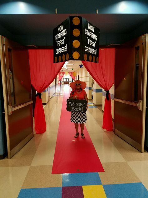 Our First Grade team decorated our hall with the movies theme for open house this year. We even dressed as movie stars and had a popcorn machine at the end of the hall and each classroom had a marquee over their door, with the teachers names in lights. Graduation Decor Ideas, Theatre Classroom, 5th Grade Graduation, Vbs 2024, Popcorn Machine, Preschool Graduation, Movie Theatre, Movie Themes, Teacher Name