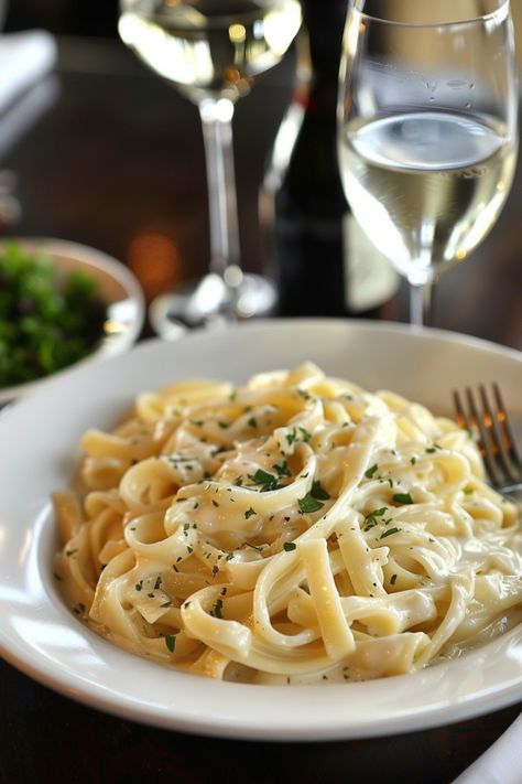 Indulge in the rich, creamy goodness of classic Fettuccine Alfredo with this easy recipe that will transport your taste buds to Italy. With simple ingredients like butter, heavy cream, and Parmesan cheese, you can create a decadent pasta dish perfect for any occasion. Whether you're cooking for a special date night or just craving some comfort food, this Fettuccine Alfredo is sure to satisfy your cravings. Fedachinni Alfredo, Fettachini Alfredo, Homemade Fettuccine, Antipasto Pasta Salads, Healthy Pasta Salad, Fettuccine Alfredo Recipes, Quick Pasta Recipes, Fettuccine Pasta, Italian Pasta Dishes