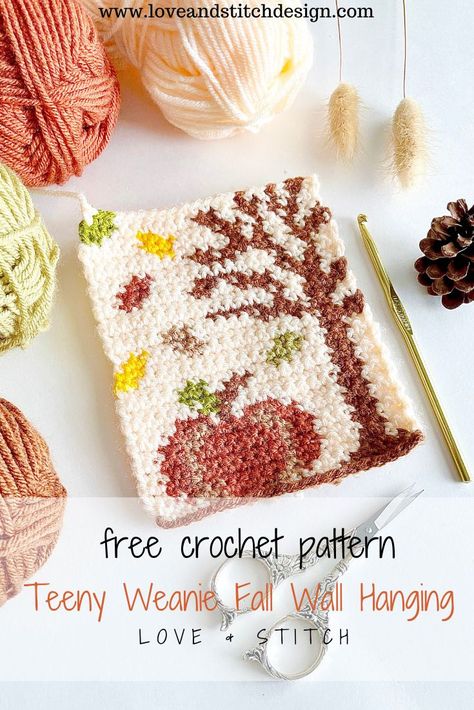 I am so excited to introduce The "Teeny Weanie" Fall Wall Hanging crochet pattern! This would make the perfect addition to your last minute market prep. It would also be the perfect decor or lockers and dorms! #crochet #crochetdesign #crochetaddict #crochetando #crochetdecor #crocheted #crochetersofinstagram #crocheter #freecrochetpattern Wall Hanging Crochet Pattern, Fall Garden Crafts, Crochet Pillow Covers Free Pattern, Fall Grid Pattern, Crochet Grid Patterns Fall, Crochet Pumpkin Wall Hanging Free Pattern, Crochet Christmas Wall Hangings, Fall Tapestry Crochet, Pumpkin Tapestry Crochet