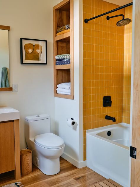 Photo 12 of 18 in My House: There’s Nothing Complicated About Emma Allen’s Asheville Home - Dwell Small Mcm Bathroom, Color Small Bathroom, Mc Bathroom, Small Colorful Bathroom, Colorful Small Bathroom, Mcm Cottage, Emma Allen, Mcm Bathroom, Yellow Bath