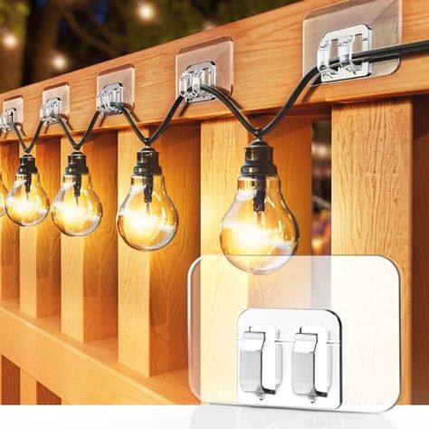 Limited-time deal: Galetcy Hooks for Outdoor String Lights - 100 Pack with Adhesive Strips - No Damage, No Tools, No Holes, Waterproof and UV-Resistant, Perfect for Christmas and Patio Decor Bulb String Lights Front Porch, String Lights On White Panel Fence, String Lights On Deck Railing Wood, String Lights In Front Yard, Edison Patio Lights Outdoor, Hanging String Lights Fence, String Lights From House To Garage, Backyard String Lights Walmart, String Lights Outdoor Bucket