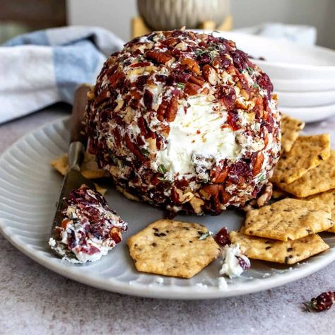 Cranberry Pecan Goat Cheese Ball Goat Cheese Cheese Ball, Cranberry Pecan Mini Goat Cheese Balls, Cranberry Pecan Goat Cheese Balls, Christmas Cheeseball Recipes, Cranberry Goat Cheese Balls, Mini Goat Cheese Balls, Honey Sriracha Brussel Sprouts, Goat Cheese Ball, Christmas Cheeseball