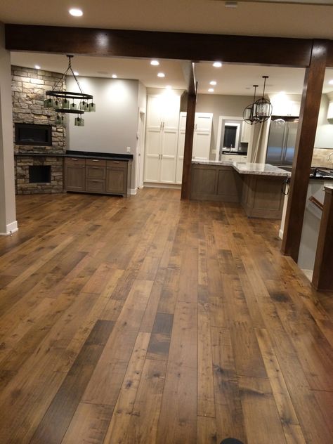 Beautiful wide variable width hickory wood floors in a great room.  Monterey, Cabana, wood floors installation in Lincoln NE. The floors were purchased from Carpets Direct and installed by Fulton Construction. Rustic Hardwood Floors, Wood Floor Colors, Hardwood Floor Colors, Floor Stain, Basement Flooring, Floor Colors, Engineered Hardwood Flooring, Vinyl Plank Flooring, Timber Flooring