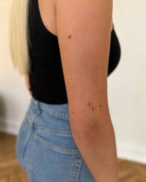 Sticker Sleeve Minimalist, Tiny Tattoos Back Of Arm, Tiny Stars Tattoo Arm, Back Of Arm Star Tattoo, Tattoo Right Above Inner Elbow, Back Star Tattoos For Women, Dainty Tattoo Above Elbow, Tiny Tattoos Upper Arm, Minimalist Star Tattoos