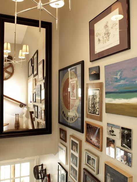 love the idea of putting a huge mirror in the dead space above the stairs. Wall Above Stairs, Above Stairs Decor, Cambridge Cottage, Cottage Staircase, Cottage Eclectic, Mirror Stairs, Stair Wall Decor, Boston Interior Design, Staircase Art