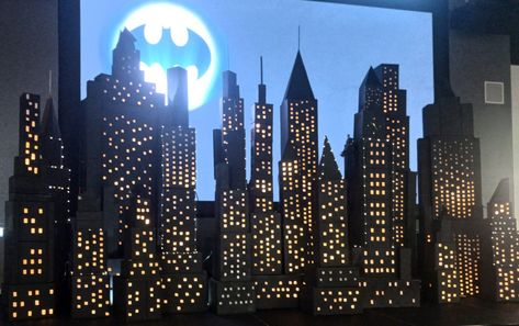 Gotham city made out of boxes hot glue parchment paper outdoor lights and spray paint Gotham City Party Decorations, Gotham City Themed Party, Gotham City Halloween Decorations, Gotham City Decorations, Gotham City Party, Party City Decorations, Batman City, Annie Jr, New York Dance