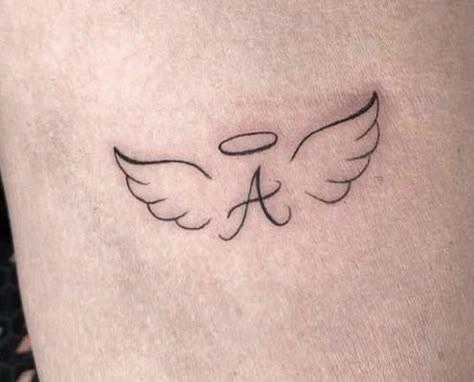 A With Angel Wings Tattoo, Small Angel Wing Memorial Tattoo, Angel Wings Tattoo With Letter, Angel Tattoo With Letter, Letter A With Wings Tattoo, Angel Small Tattoo For Women, Angel Wings Wrist Tattoo For Women, Forever 15 Tattoo, Tiny Angel Tattoos For Women