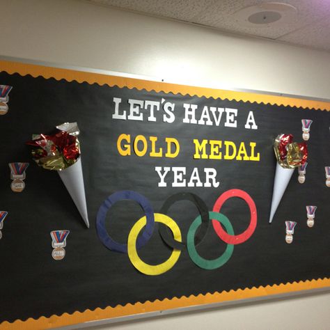 Olympic themed room this year! Olympic Bulletin Board, Sports Bulletin Boards, Physical Education Bulletin Boards, Pe Bulletin Boards, Olympics Decorations, Olympic Idea, Sports Theme Classroom, Olympic Theme, Olympic Rings