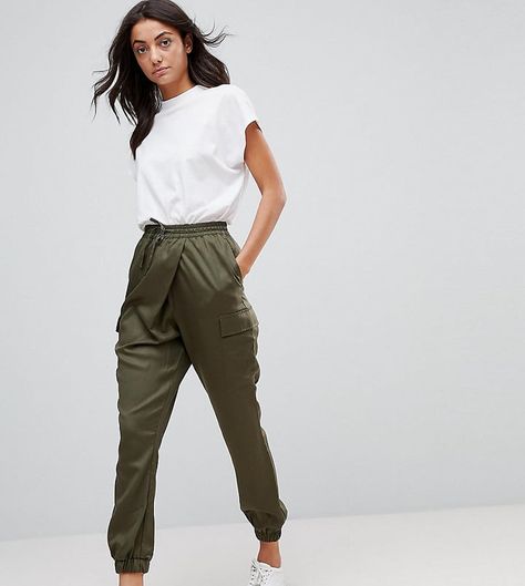 How to Style Jogger Pants Beyond the Typical Airport Outfit #airportoutfit #traveloutfit #joggers #casualoutfit #joggerpants How To Wear Joggers, Silk Joggers, Joggers Outfit, Woven Wrap, Popsugar Fashion, Popsugar, How To Style, Jogger Pants, Asos