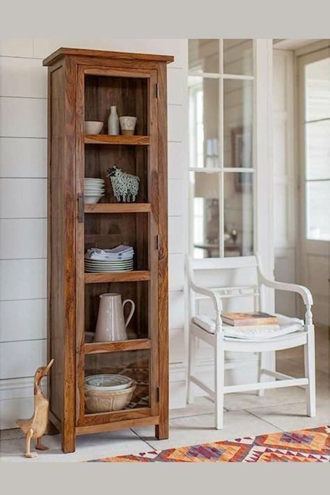 A long crockery cabinet is a beautiful and functional piece of furniture that can enhance the look and organization of your dining room. With ample storage space and elegant design, a long crockery cabinet can help you display and protect your valuable crockery and dinnerware | Color - Walnut | Primary Material: Solid Sheesham Wood, Finish Semi Gloss | #Sponsored Cupboard For Bedroom, Kitchen Door Styles, Kitchen Crockery, Crockery Cabinet Design, Tower Cabinet, Wooden Almirah, Crockery Cabinet, Crockery Unit Design, Almirah Designs