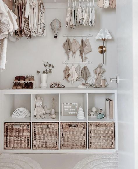 Baby Room Bookshelf, Ikea Wall Storage Nursery, White Shelf Baby Room, Shelf With Baskets Nursery, Bookshelf Baby Closet, Ikea Baby Book Shelf, Emma Nursery, Nursery Bookshelf Ideas, Nursery Closets