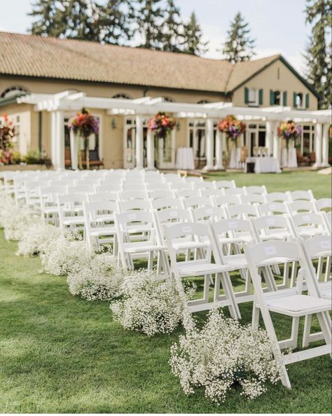 White Wedding Chair Decorations, Isle Chair Decorations Wedding, White Chair Ceremony, Ceremony Aisle Decor Outdoor Simple, Baby Breath Down The Aisle, Diy Aisle Decorations Wedding Outdoor, Baby’s Breath Aisle Decor, Baby Breathe Weddings, White Wedding Chairs Ceremony