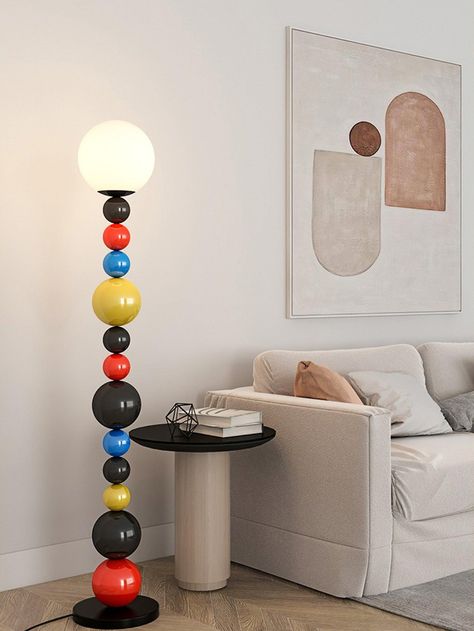 The Colorful Round Ball Floor Lamp is a unique and stylish indoor lighting product that adds a touch of vibrancy and modernity to your space with its eye-catching design and colorful illumination. This floor lamp is crafted using a combination of metal and glass materials, combining elegant aesthetics with high-quality craftsmanship. 
 Inspired by the shape of a round ball, this lamp showcases a dynamic and creative appearance. It is available in green and red colors for the lamp body, allowing Ball Floor Lamp, Farmhouse Chandeliers, Living Room Den, Swag Light, Task Floor Lamp, Apartment Aesthetic, Lampe Design, Aesthetic Vibes, Led Desk Lamp