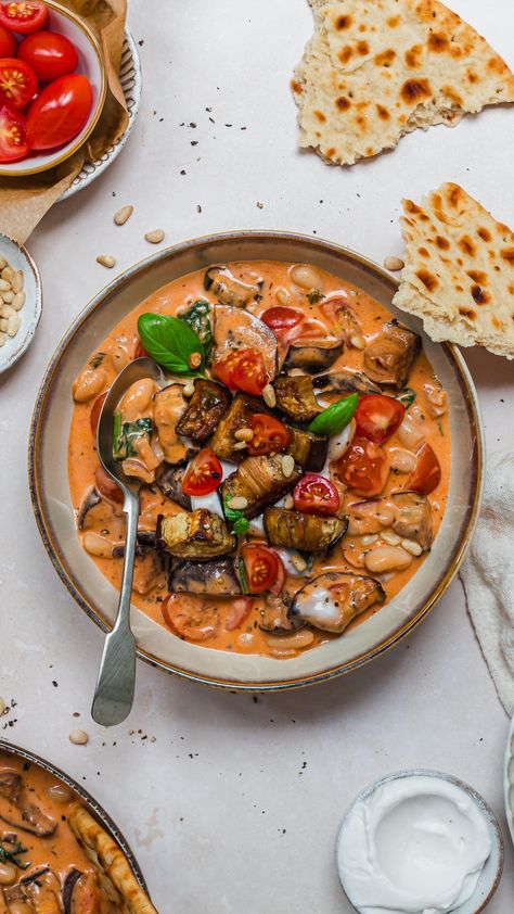 Roasted Aubergine Creamy Tomato Beans 🍅🍆  Ready in 30 minutes, these high-protein creamy saucy beans are packed with tomatoes and aubergines and tomato pesto, perfect for a midweek meal - who wants some?  .  Welcome to another episode of 30-minute vegan meals and these DELICIOUSLY tomatoey, pesto and creamy beans, packed balsamic roasted aubergine, and a great source of protein and fibre and ready with minimal effort and maximum flavour ✨  .  These beans are perfect with breads, rice or other whole Saucy Beans, Creamy Beans, Roasted Aubergine, Coconut Yoghurt, Tomato Puree, Dried Basil, Plant Based Cookbook, Tomato Pesto, High Protein Vegan