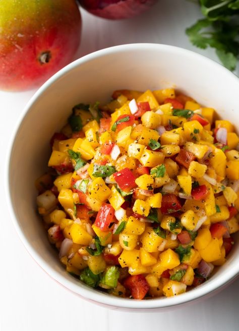 Peach Mango Habanero Salsa Recipe - This fresh chunky peach mango salsa is made with sweet fruits and roasted habanero peppers for a kick of delicious spicy flavor. It's a perfect pico de gallo for summer! | A Spicy Perspective Peach Mango Salsa, Habanero Salsa Recipe, Chipotle Corn Salsa, Mango Habanero Salsa, Peach Salsa Recipes, Habanero Salsa, A Spicy Perspective, Chunky Salsa, Easy Salsa