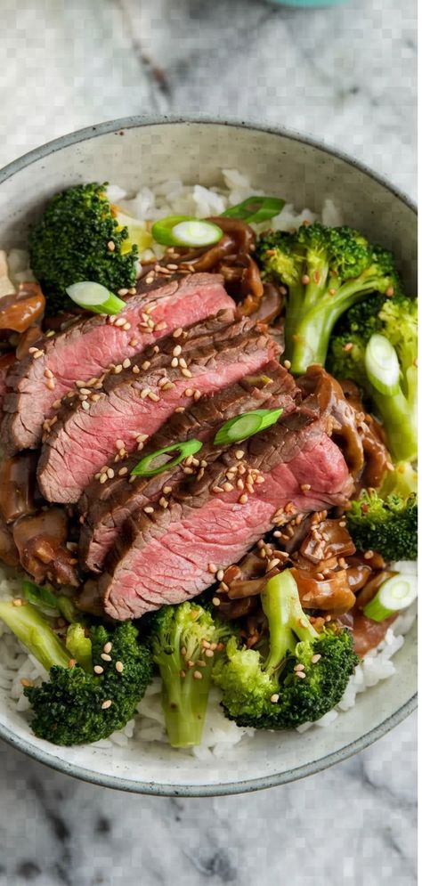 A photo of a  Beef and Broccoli Dinner Bowl a Dinner Bowl Recipes And Ideas Flank Steak Bowl, Steak Bowls With Rice, Steak Bowls Healthy, Dinner Bowl Recipes, Steak Rice Bowl, Protein Rich Meals, Steak Bowls, Tender Flank Steak, Broccoli Bowl