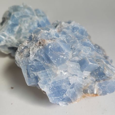 Some beautiful natural blue calcite I couldn't pass up #calcite #calcitecrystal #bluecalcite #rawgemstones #gemstoneshop #gemstoneseller #gemshop #smallbusiness #womanownedbusiness #gemstones #rockcollection #rocksandminerals #rockhound #rockshop #rockhounding #rockhounds #treatyoself #treatyourself #ineedthis #crystal #crystals #crystalvibes #crystalshop #crystalaesthetic #gemlover #crystalhealing Blue Celestite, Geode Stone, The Gift Of Prophecy, Crystal Vibes, Crystal Aesthetic, Grayish Blue, Gem Shop, Blue Calcite, Crystal Healing Stones