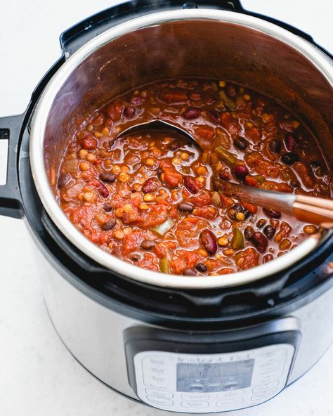 This is the BEST Instant Pot vegetarian chili, featuring two beans, lentils, and a robust flavor. (It's vegan too.) Pressure cooker chili is fast and easy! #instantpot #pressurecooker #chili #instantpotchili #healthy #dinner Instant Pot Vegetarian Chili, Recipes Using Turmeric, Vegetarian Chili Crock Pot, Pressure Cooker Chili, Instant Pot Vegetarian, A Couple Cooks, Vegetarian Chili Recipe, Vegan Instant Pot Recipes, Creamy Recipes