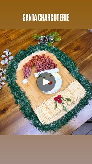 1.4K reactions · 321 shares | SANTA CHARCUTERIE 🎅🏻🧀 Put together this board for any Christmas party or gathering! I love how he turned out☺️

🔗Shop the exact meats I used on my LTK & Amazon 

INGREDIENTS:
-Wheel of brie cheese 
-Sliced olives
-Strawberry 
-Olli Salumeria meats
-Rosemary
-Raspberries 
-Crackers 

DIRECTIONS:
1. Slice off some of your brie cheese.
2. With that slice, cut a half moon at the top and bottom leaving a strip in the middle.
3. Place one half moon at the bottom of the brie for his beard and the strip at the top for his hat. 
4. Use the other half moon to carve a beard and ‘cloud’ to go at the end of his hat.
5. Cut a sliced olive in half for his eyes.
6. Cut a diamond shaped strawberry for his mouth.
7. To fill in his hat, begin rolling your meats by folding th Santa Charcuterie Board, Santa Charcuterie, Cherry Delight, Charcuterie Inspiration, Candy Recipes Homemade, Brie Cheese, Christmas Cooking, Christmas Appetizers, Food Board