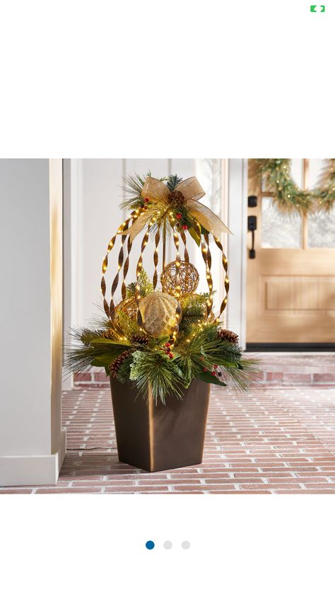 Christmas Decorations From Nature, Front Porch Christmas Planters, Outdoor Pillar Christmas Decorations, Back Porch Christmas Decor, Christmas Porch Garland, Christmas Topiary Outdoor, Christmas Pots Outside Front Porches, Christmas Ball Topiary, Winter Pots Outdoor Front Doors