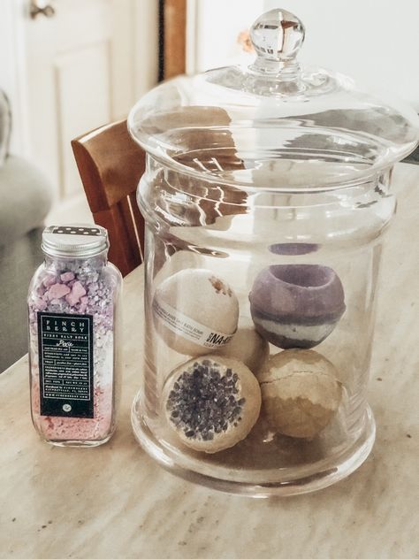 Perfect storage solution for bath bombs. Bath Salt And Bubble Bath Storage, Bath Bomb Storage, Jar Filler Ideas, Large Glass Canisters, Apothecary Jars Bathroom, West Elm Rug, Bathroom Jars, Apothecary Decor, Dream Bath