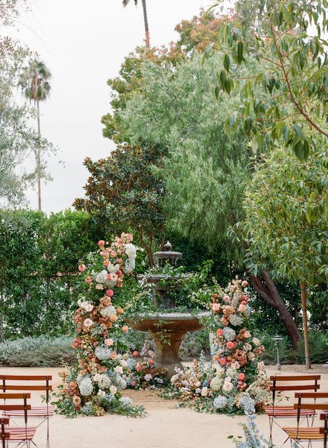 Spanish Garden Wedding Theme, Spanish Wedding Ceremony, Wedding Ceremony In Front Of Fountain, Fountain Florals Wedding, Fountain Wedding Ceremony, Fountain Wedding Decor, Fountain Florals, Pergola Wedding Ceremony, Wedding Ceremony Backdrop Ideas