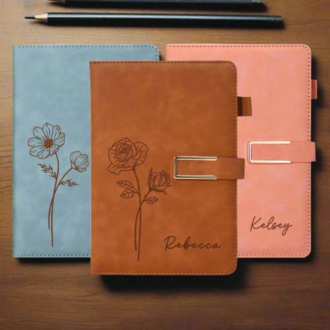 Custom Journal with Birth Flower and Name, Engraved Leather Journal, Personalized Journal, Personalized Leather Journal, Journal Notebook Material: Vegan Leather Color: Pink, Light Blue, Grey, Brown, Red, Dark Blue, Green Size: A5,  5.7"x8.27" (14.5x21cm) 100 pages This Custom Journals make a perfect gift for Graduations, Weddings, Birthdays, Christmas, Housewarmings, Anniversaries or just about any other occasion.. Journals are made from a high quality, durable, vegan friendly leatherette material.  The precision of our laser engraving process ensures a lasting and visually striking design, making each journal a unique masterpiece. Personalised Leather Journals, Custom Journal, Custom Journals, Personalized Journal, Leather Journal, Appreciation Gifts, Birth Flowers, Personalized Leather, Teacher Appreciation Gifts