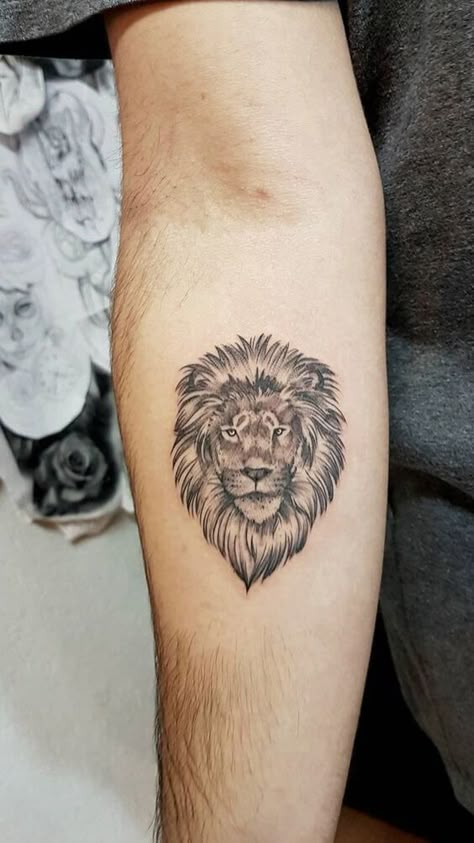 24 Small Lion Tattoo Designs and Ideas | PetPress Small Leo Tattoo, Simple Lion Tattoo, Lion Tattoo Meaning, Lion Hand Tattoo, Small Lion Tattoo, Herren Hand Tattoos, Leo Tattoo Designs, Mens Lion Tattoo, Lion Head Tattoos