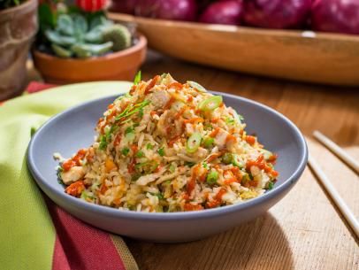 Sunny's Nunya Business Chicken Fried Rice Casserole Recipe | Food Network Fried Rice Casserole, Baked Fried Rice, Nunya Business, Pan Dishes, The Kitchen Food Network, Sunny Anderson, Rice Casserole Recipes, Chicken Fried Rice, Chicken Fried