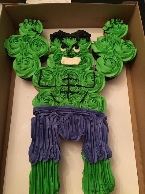 Hulk cupcake cake                                                                                                                                                                                 More Superhero Cupcake Cake, Hulk Birthday Party Cake, Hulk Pull Apart Cupcakes, Super Hero Pull Apart Cupcakes, Hulk Birthday Cake Ideas, Hulk Party Ideas, Hulk Cupcake Cake, Marvel Pull Apart Cupcakes, Hulk Birthday Cupcakes