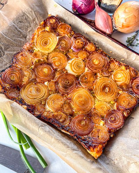 Upside down Onion Tart — The Global Vegetarian Tarts Puff Pastry, Puff Pastry Vegan, Onion Tart, Garlic Olive Oil, Garlic Oil, Puff Pastry Sheets, Pastry Sheets, Pepper Powder, Shredded Mozzarella