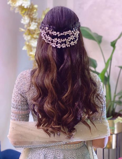 Bride, Wedding Ceremony, Bridal Look, Bridal makeup, Bridal Hairstyle, Hairstylist, Bridal Jewellery, traditional gajra, flower garlands, maang tikka, matha patti, glittering hair studs, bold maang tikkas, innovative designs, spunky floral tiaras, Bridal Hair Accessories, Indian Bride, floral reverse tiaras, metallic half tiaras, colorful butterfly hair studs, Dainty tiaras, pastel floral crowns, and minimalistic hair combs Hair Styles With Hair Accessories Wedding, Hairstyle With Accessories Indian, Hairstyles With Hair Accessories Indian, Bridal Hair Accessories Indian, Hair Brooch Indian Wedding, Hairstyles With Brooch, Mang Teeka Hairstyle, Hair Accessories For Indian Wedding, Flower Tiara Hairstyles