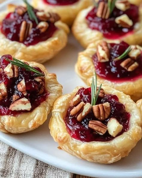 Valerie Bertinelli Recipes | 🧀 Cranberry Brie Bites: A Festive Holiday Appetizer 🎉✨ | Facebook Leftover Cranberry Sauce Recipes, Cranberry Brie Appetizer, Brie Appetizer Bites, Brie Christmas, Thanksgiving Snacks Appetizers, Leftover Cranberry Sauce Recipe, Cranberry And Brie, Cranberry Pistachio Cookies, Cranberry Sauce Recipes