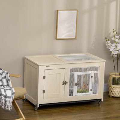 If you can't decide what room you want your bunny in, this rolling design lets you wheel them wherever want them to be and avoid heavy lifting. The indoor rabbit cage from Tucker Murphy Pet™ has a combination of darkness and light, catering to a bunny's natural desire to sleep in the shade. We offer convenience for you, and comfort for your pet. | Tucker Murphy Pet™ Daryann Rabbit Hutch Solid Wood (common for Rabbit Hutches) in Brown / White | 24.5 H x 37.5 W x 20.75 D in | Wayfair Rabbit Hutch Indoor, Indoor Rabbit Cage, Hutch Furniture, Guinea Pig Hutch, Bunny Cage, Rabbit Habitat, Bunny Hutch, Guinea Pig House, Darkness And Light