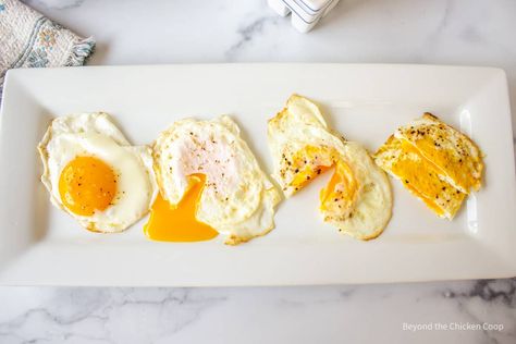 Sunny side up eggs are an easy to make fried egg that are not flipped. The eggs are just cooked on one side and the yolk is runny. These eggs are perfect for breakfast or brunch. Eggs For Sandwiches, Over Medium Eggs, Brunch Favors, English Muffins Sandwich, Eggs Over Medium, Sunny Side Up Eggs, Egg Calories, Cooking Eggs, Over Easy Eggs