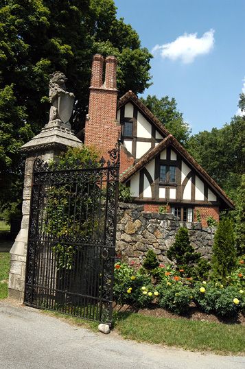 The front gate and Gate Lodge at Stan Hywet Hall and Gardens. Gate Lodge, Stone Quarry, Tudor Revival, Wood Shingles, Front Gate, Front Gates, Thatched Roof, Witch House, Roof Shingles