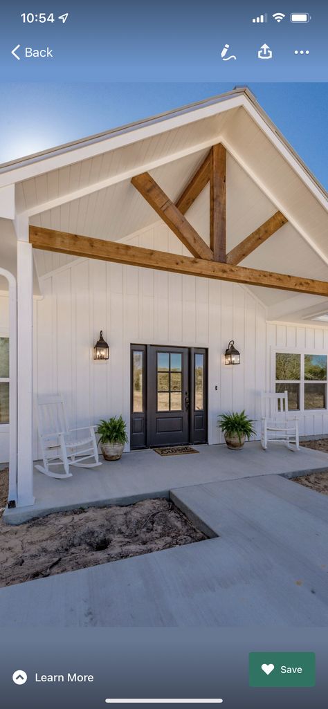 Tin Barndominium Exterior, White Siding Cedar Accents, Farmhouse Gables Exterior, Barndominium White Exterior, Exterior House Paint Color Combinations Farmhouse Board And Batten, White Metal Barndominium, Farmhouse Metal Siding, White Metal Roof House, Barndominium Curb Appeal